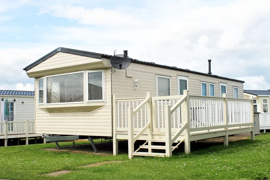 A park home, also known as a static caravan or mobile home.